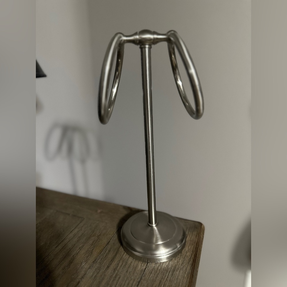 Small towel holder, brushed nickel, has some imperfections, see pictures.